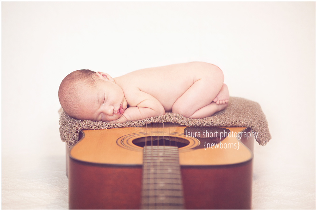 newborn-on-guitar-pose-baltimore-newborn-photographer