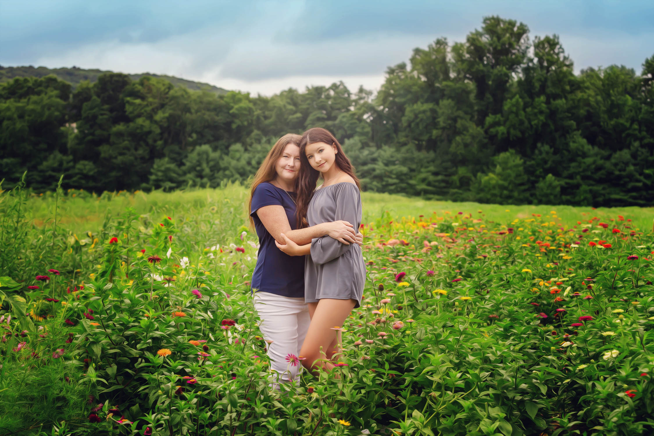 mom and daughter in wildflowers